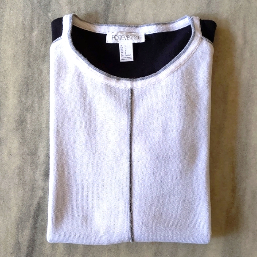 NWOT. Forever 21 Junior Cotton blended sweater with multi colored design.